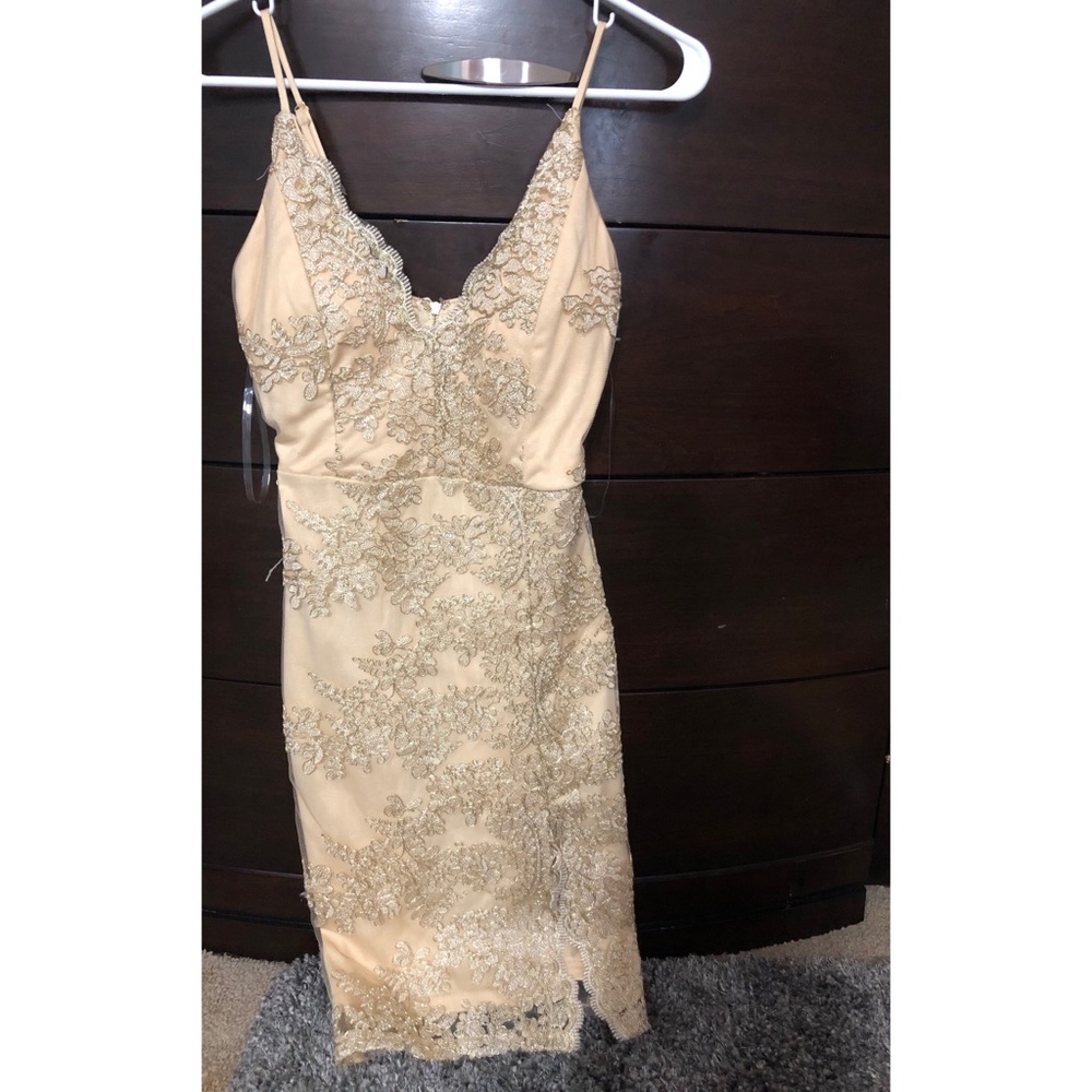 Gold fashion dress that’s never been worn!